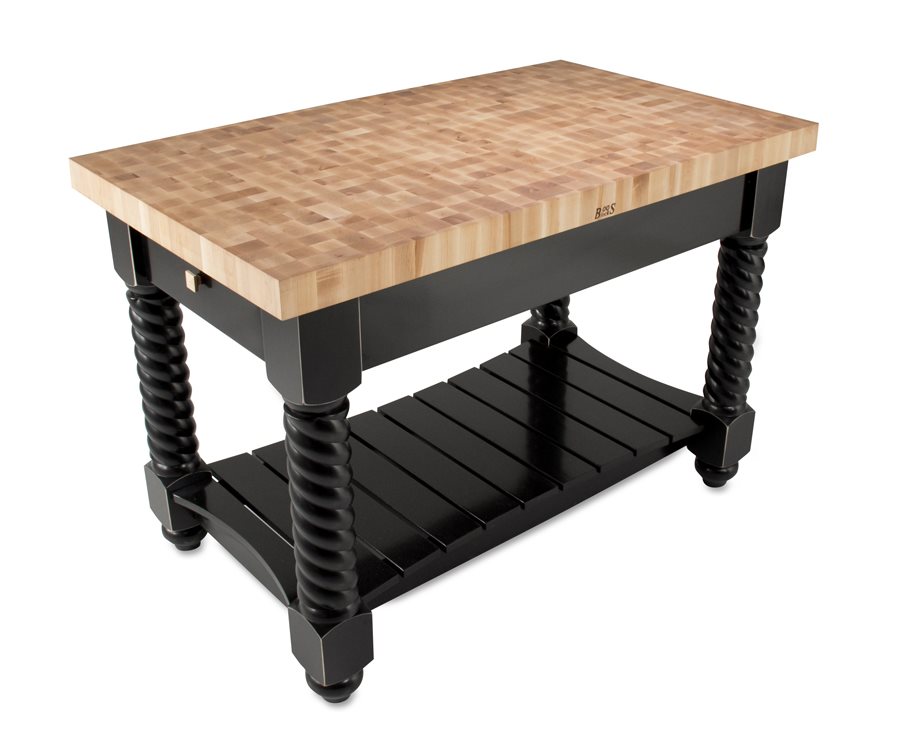 End-grain maple butcher block island with black barley-twist legs, slatted shelf and a closed drawer